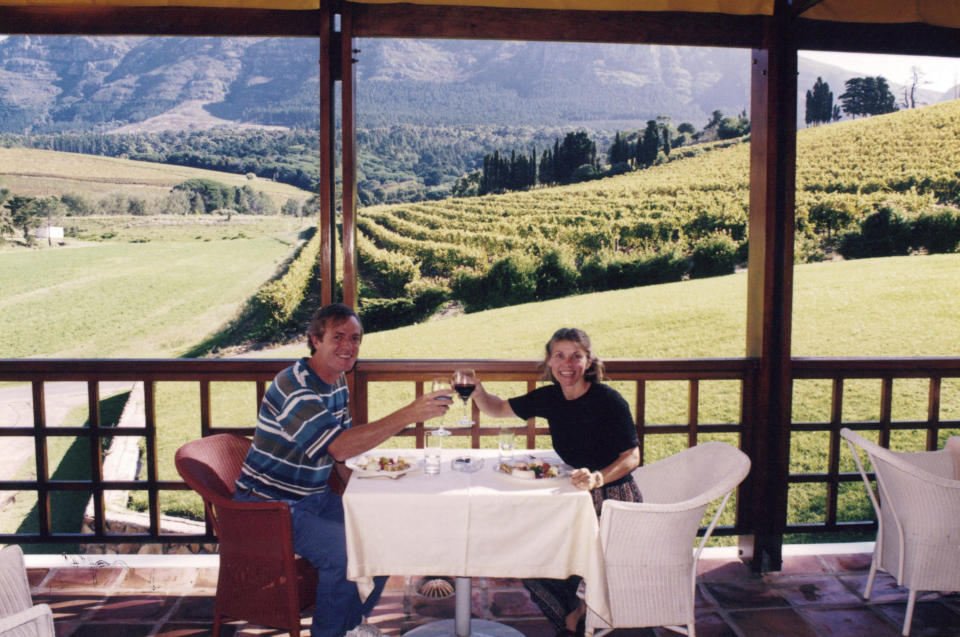 This photo provided by Lyne Paquette shows her with her husband vacationing in Stellenboch, South Africa visiting vineyards and restaurants in April 1996. (Courtesy Lyne Paquette via AP)