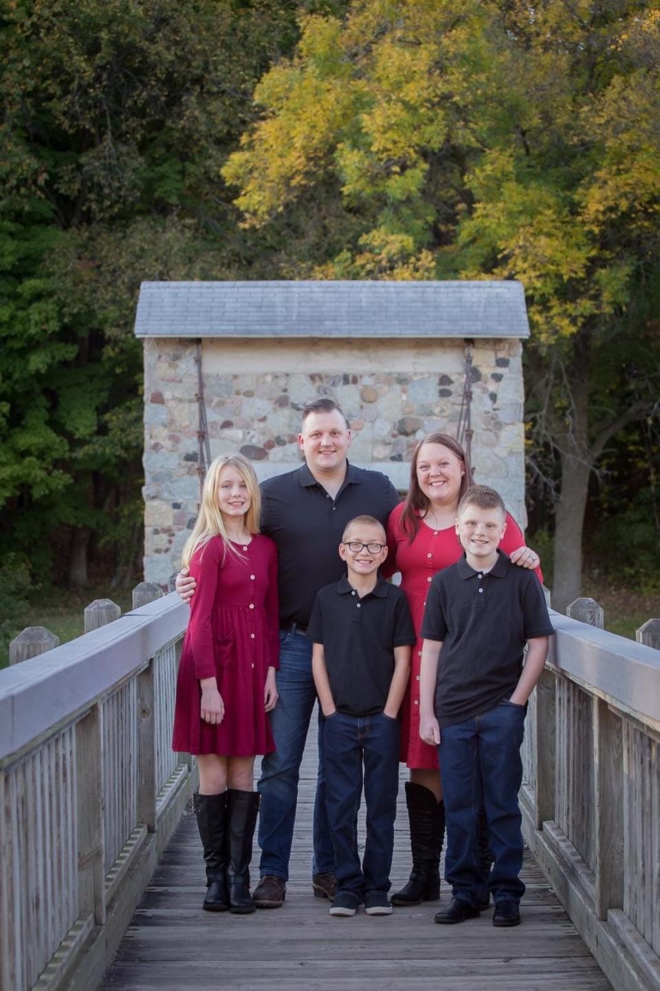From left to right: Charlotte Passamoni, 13, Shane Passamoni, 34, Alec Passamoni, 12, Jessica Passamoni, 32, and Coltyn Feld, 13. The Passamonis adopted Charlotte and Alec in September 2022 after fostering them more than two years.