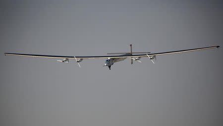 Solar Impulse 2, a solar powered plane piloted by Swiss aviator Andre Borschberg, is seen as it prepares to land at Cairo Airport, Egypt July 13, 2016. REUTERS/Amr Abdallah Dalsh