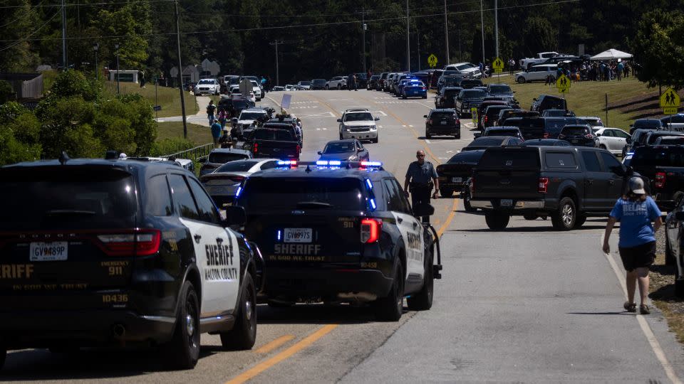 Law enforcement and emergency personnel direct traffic after a shooting at Apalachee High School in Winder, Georgia, on September 4, 2024. - Christian Monterrosa/AFP/Getty Images