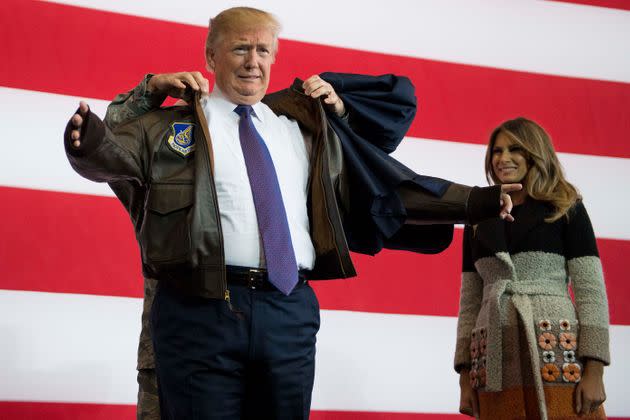 Trump receives a bomber jacket from the U.S. Pacific Air Forces in 2017. (Photo: AFP Contributor via Getty Images)