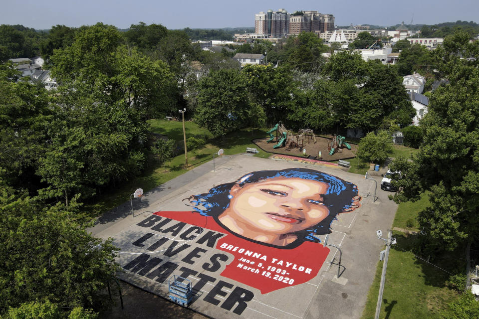 FILE - In this July 6, 2020, file photo a ground mural depicting a portrait of Breonna Taylor is seen at Chambers Park, Monday, July 6, 2020, in Annapolis, Md. Americans' suggestions of suitable statues for President Donald Trump's planned National Garden of American Heroes are in, and they look considerably different from the predominantly white worthies that the administration has locked in for many of the pedestals. Lehigh County, Pennsylvania Commissioner Amy Zanelli, suggested George Floyd, Breonna Taylor, and other Black Americans whose killings by police sparked massive street protests. (AP Photo/Julio Cortez, File)