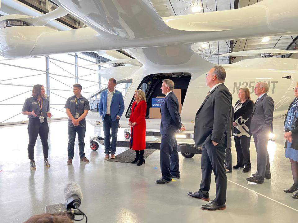 First Lady Jill Biden, center, talks to a couple interns and CEO Kyle Clark of BETA Technologies. She was joined by Governor Phil Scott and U.S. Secretary of Education Miguel Cardona on April 5, 2023.