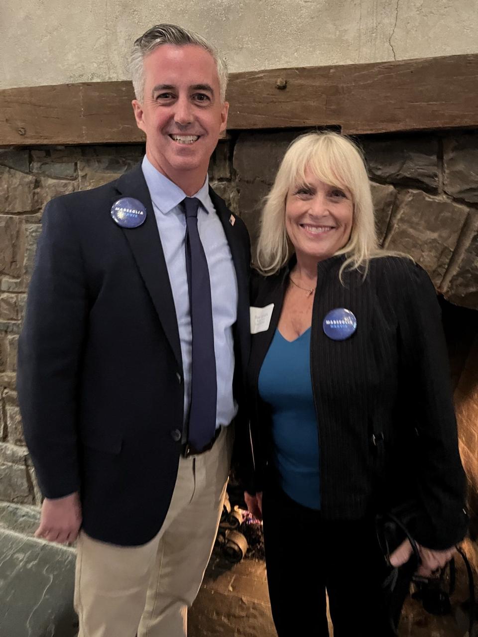 Bucks County Commissioner Chairman Bob Harvie and Commissioner Diane Ellis Marseglia, both Democrats, appeared elated as they posed at the Democratic post-election party Tuesday night at the Barley Sheaf Inn in Buckingham.