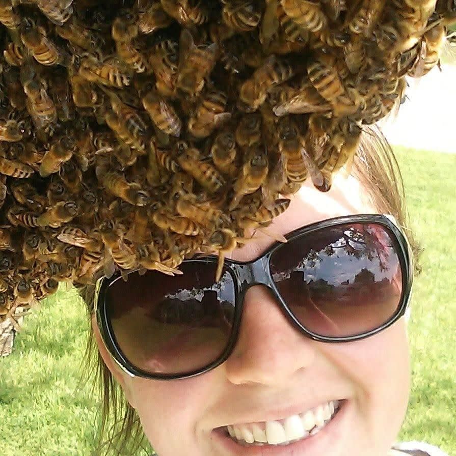 Emily Mueller is an experienced bee keeper with a environmentally-friendly honey removal service on Ohio. Photo: Emily Mueller