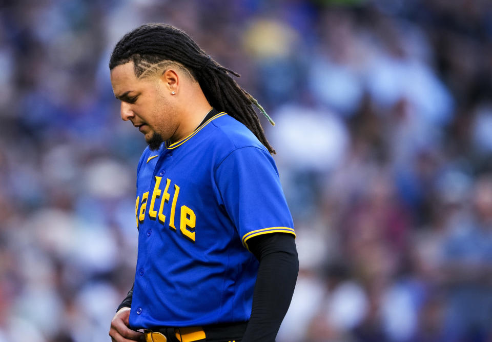 Seattle Mariners starting pitcher Luis Castillo walks off the field after the top of the fifth inning against the Detroit Tigers in a baseball game Friday, July 14, 2023, in Seattle. (AP Photo/Lindsey Wasson)