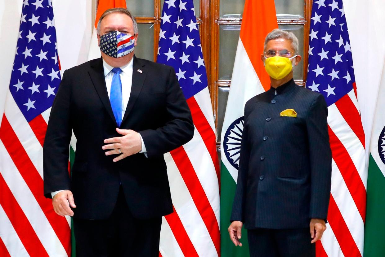 US Secretary of State Mike Pompeo (L) and India’s Foreign Minister Subrahmanyam Jaishankar stand during a photo opportunity before their meeting at Hyderabad House in Delhi on Monday (POOL/AFP via Getty Images)