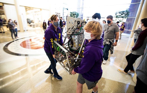 Several teams of high school students with FIRST Inspires (For Inspiration and Recognition of Science and Technology) move their robot during the FRC Kickoff Event at the FAMU-FSU College of Engineering in January 2022. This year's event takes place Jan. 7.