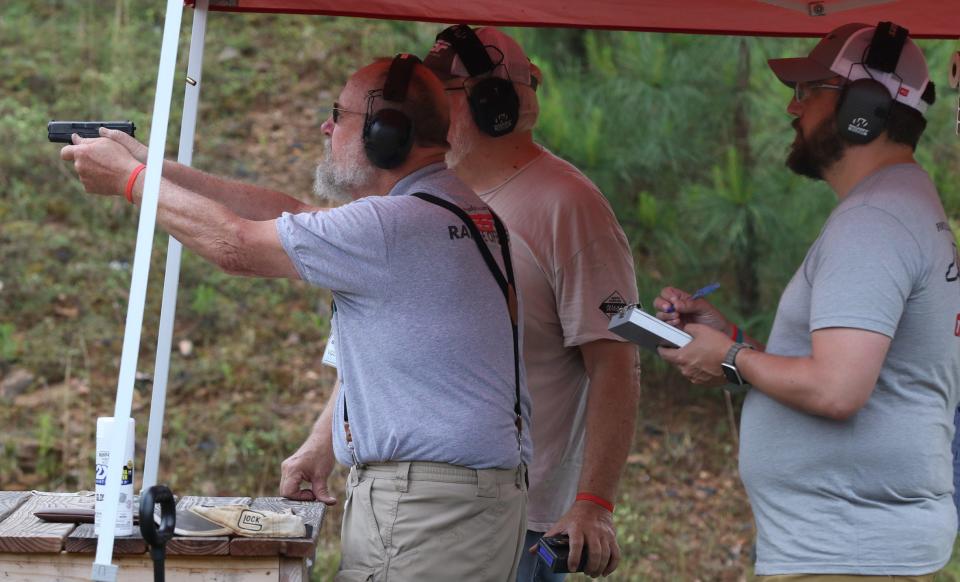 Charles Cook fires his Glock during the third annual GSSF Match: Glock sport shooting foundation match Saturday, May 4, 2024, at the Foothills Public Shooting Complex.