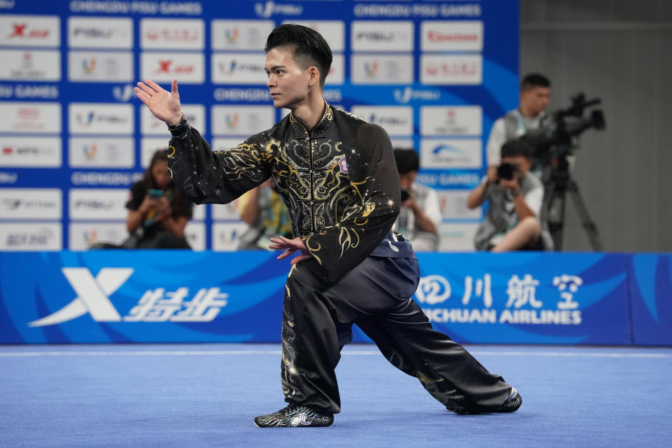 台灣男子武術好手孫家閎繼29日成都世界大學運動會太極劍奪銀後，30日在太極拳項目以9.693分，獲得金牌，這也是台灣隊本屆首面金牌。（圖／大專體總提供）

