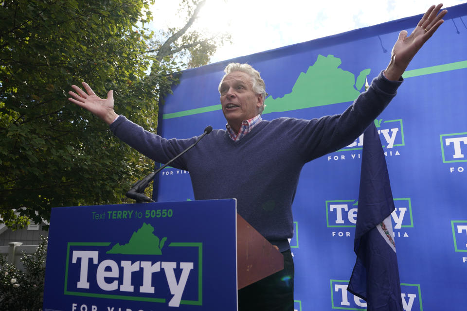 Democratic gubernatorial candidate former Virginia Gov. Terry McAuliffe reacts to the crowd during a rally in Richmond, Va., Sunday, Oct. 31, 2021. McAuliffe will face Republican Glenn Youngkin in the November election. (AP Photo/Steve Helber)