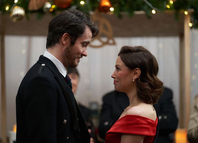 <p>Great American Media</p> Dominic Watters (left) and Jill Winternitz in <em>Christmas in Scotland</em>