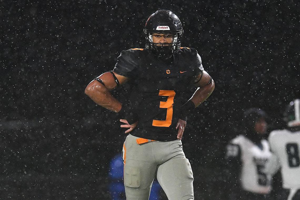 Fuquay-Varina’s Malcolm Ziglar (3) looks to the sidelines between plays against Southeast Raleigh . The Fuquay-Varina Bengals and the Southeast Raleigh Bulldogs played a conference football game in Fuquay-Varina, N.C. on September 22, 2023.