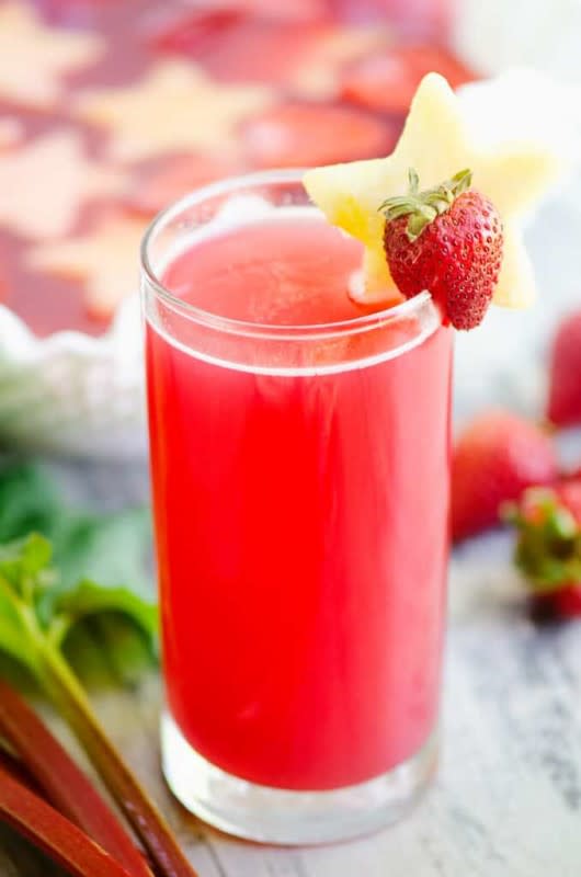 <p>The Creative Bite</p><p>The perfect festive punch for all your summer parties.</p><p><strong>Get the recipe: <a href="https://www.thecreativebite.com/strawberry-rhubarb-punch/" rel="nofollow noopener" target="_blank" data-ylk="slk:Strawberry Rhubarb Punch;elm:context_link;itc:0;sec:content-canvas" class="link rapid-noclick-resp">Strawberry Rhubarb Punch</a></strong></p>