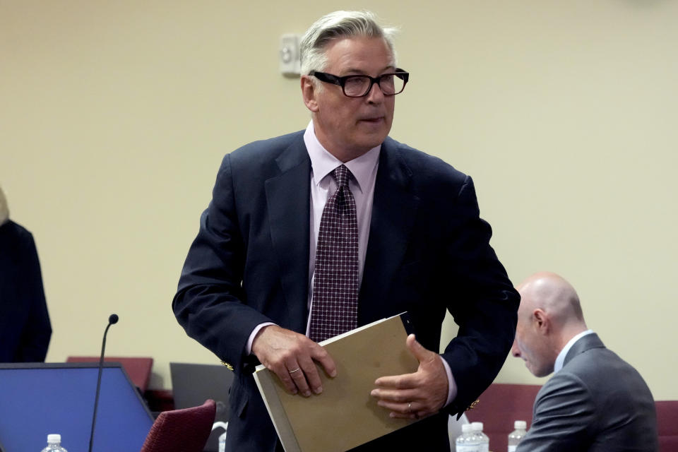 Actor Alec Baldwin stands during a break in his hearing in Santa Fe County District Court, Wednesday, July 10, 2024, in Santa Fe, N.M. Baldwin is facing a single charge of involuntary manslaughter in the death of a cinematographer. (AP Photo/Ross D. Franklin, Pool)