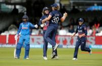 Cricket - Women's Cricket World Cup Final - England vs India - London, Britain - July 23, 2017 England's Sarah Taylor and Natalie Sciver celebrate running out India's Mithali Raj Action Images via Reuters/Andrew Couldridge