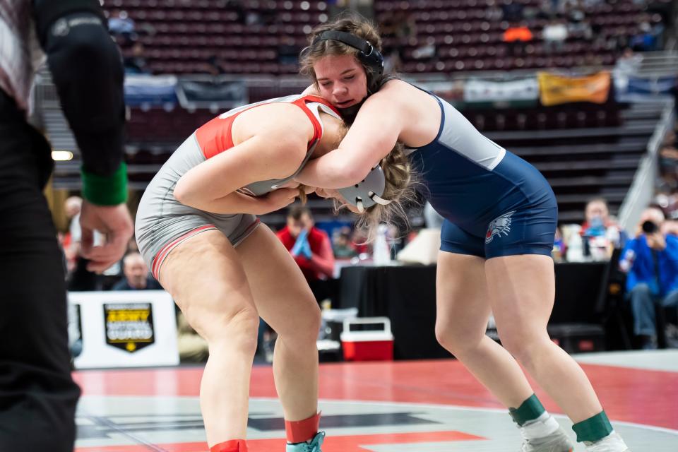 Dallastown's Avery Baldwin (right) wrestles Wallenpaupack's Ariel Manning in a 155-pound first round bout at the PIAA Girls' Wrestling Championships at the Giant Center on March 7, 2024, in Hershey. Manning won by fall, 1-0, at 4:43.