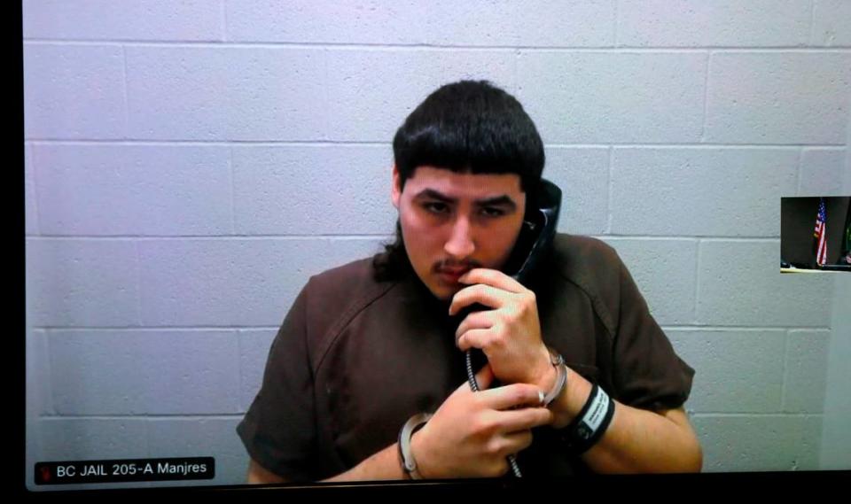 Murder suspect Felipe Manjares, 19, appears via a video link in Benton County Superior Court in Kennewick.