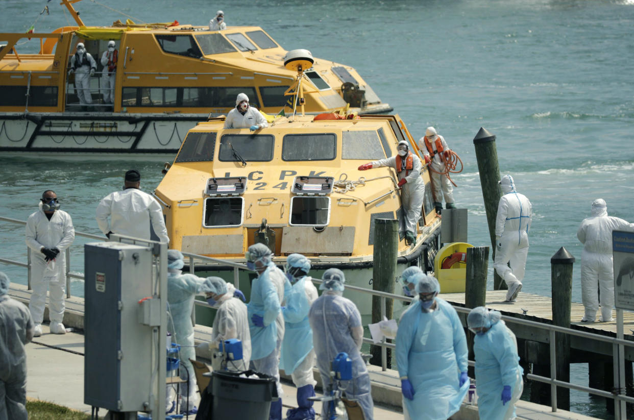 Costa Favolosa cruise ship lifeboats arrive with crew members showing COVID-19 symptoms at the US Coast Guard Station Miami Beach on Thursday, March 26, 2020.(Photo: David Santiago/Miami Herald/TNS via Getty Imates) 