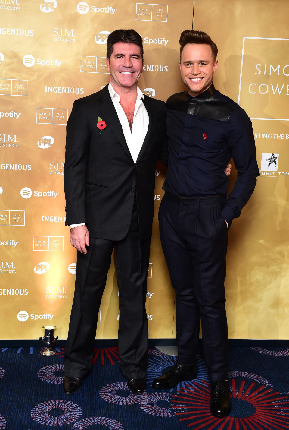 Simon Cowell and Olly Murs attending the Music Industry Trusts Award (MITS) in aid of charities Nordon Robbins and Brit Trust at the Grosvenor House Hotel, London.