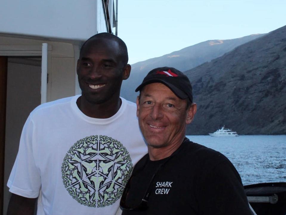 Kobe Bryant with Martin Graf of Shark Diver