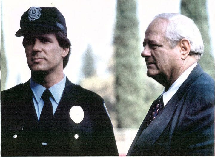 Hugh Gillin, right, appeared in a 1994 episode of the TV series "Knight Rider" with his son Tim Gillin. Hugh played the role of police chief and Tim was an officer.