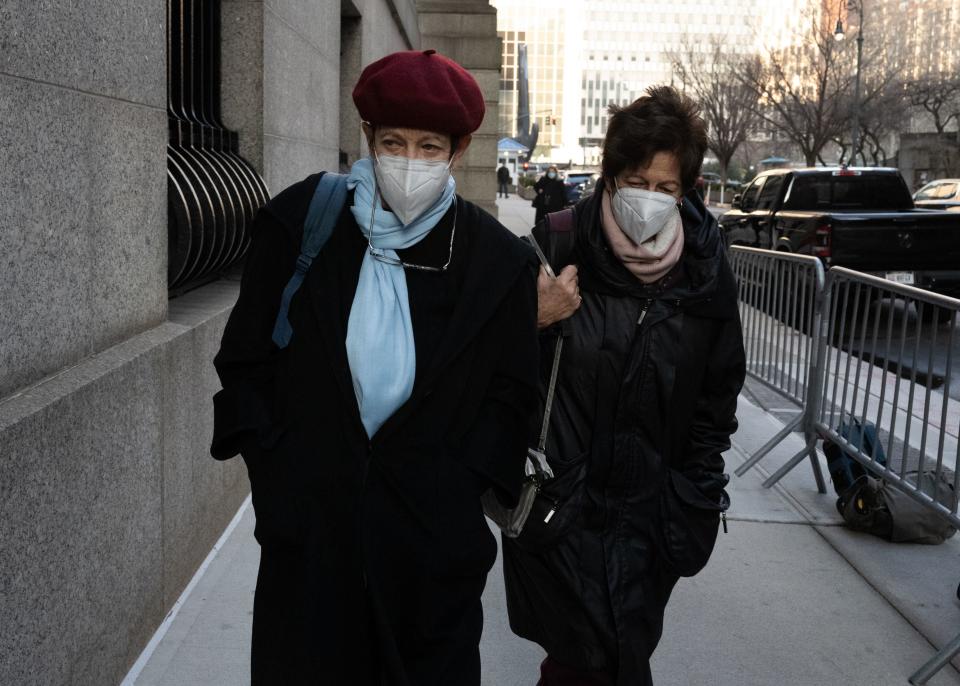 Ghislaine Maxwell’s sisters Isabel (left) and Christine (right) are seen entering the Manhattan court on 28 December (PA)