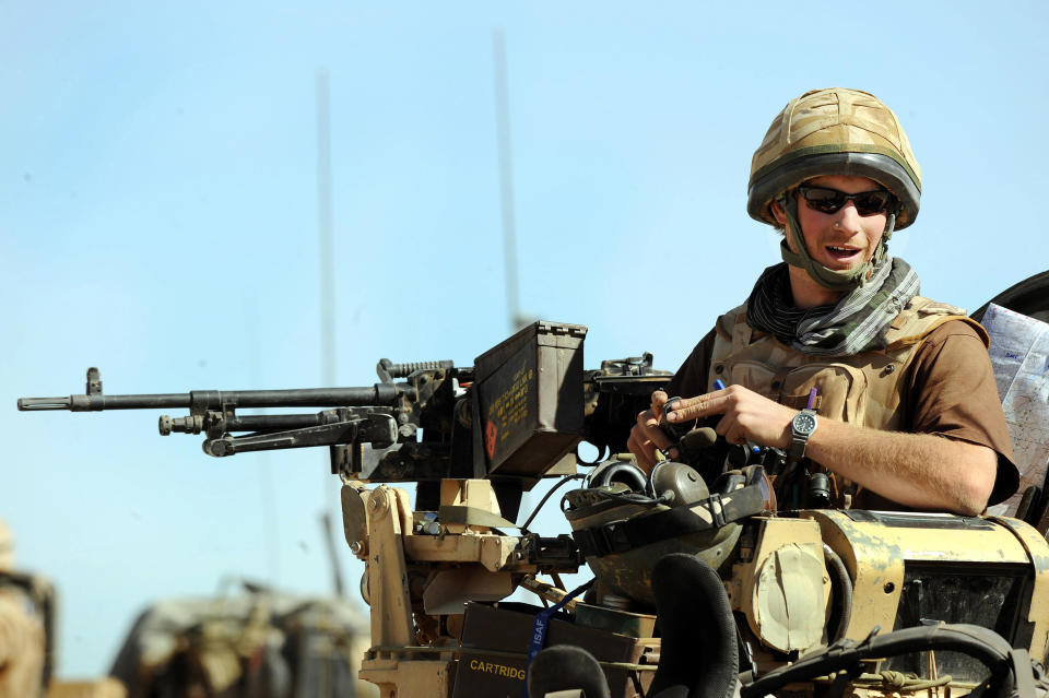 Prince Harry sits atop a spartan armoured vehicle on January 2, 2008 in Helmand Province, Afghanistan