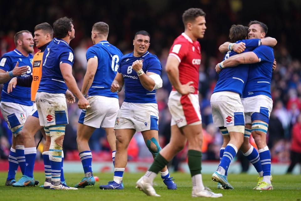 Italy players celebrate after beating Wales in the 2022 Six Nations (Mike Egerton/PA) (PA Archive)