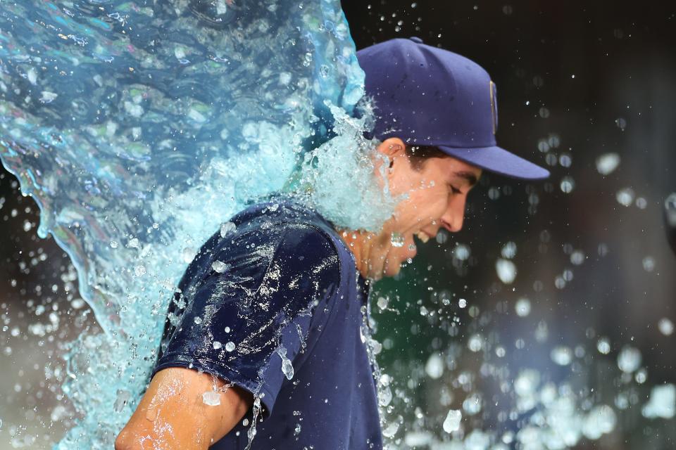 Brewers starting pitcher Robert Gasser gets doused with Gatorade following the victory over the Cardinals on Friday night at American Family Field. Gasser tossed six shutout innings, allowing just two hits with no walks and four strikeouts in his major-league debut.