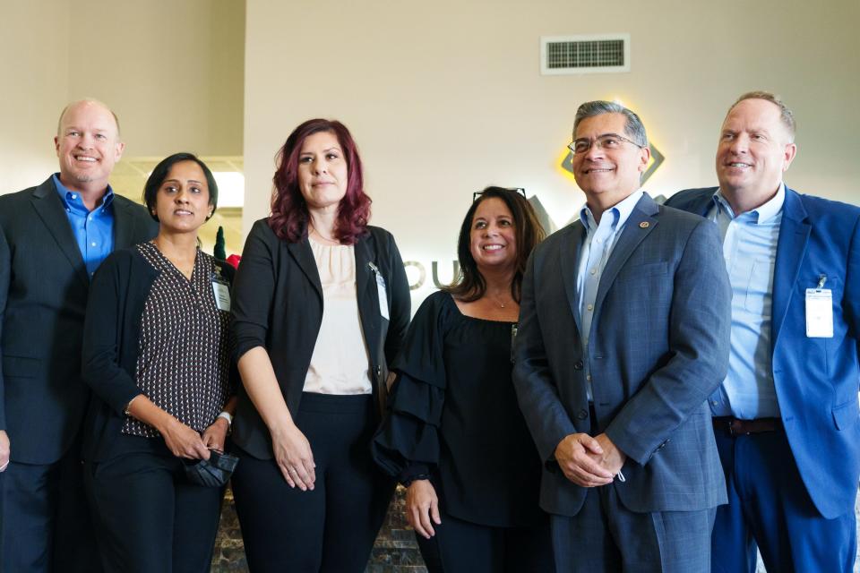 Health and Human Services Secretary Xavier Becerra visits South Mountain Post Acute skilled nursing facility on Dec 8, 2022, in Phoenix, Ariz. Left to right are David Voepel, Vinne Srivastava, Lisa Leveque, Xavier Becerra and Courtney Fischbeck.