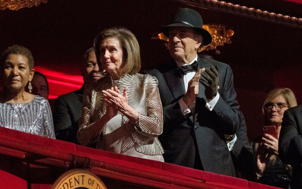 Paul Pelosi, with one black glove, makes his first public appearance since the attack at his home in California - Manuel Balce Ceneta/AP