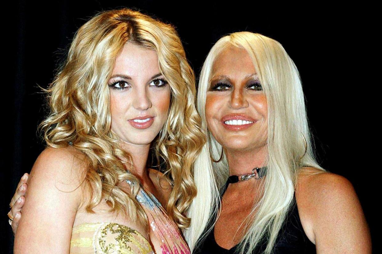 BRITNEY SPEARS AND DONATELLA VERSACE VERSACE SPRING SUMMER 2003 FASHION SHOW, MILAN, ITALY - 01 OCT 2002