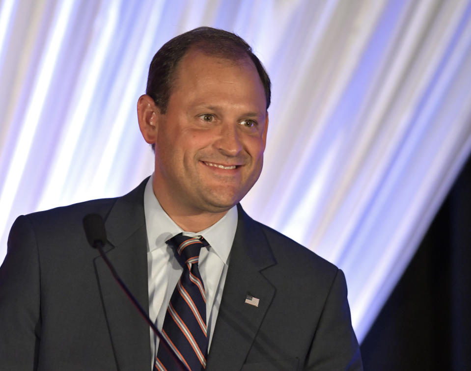 FILE- In this Aug. 25, 2018, file photo Rep. Andy Barr, R-Ky., addresses the audience during the Republican Party's Lincoln Dinner in Lexington, Ky. The White House announced recently that Trump plans to visit Kentucky ahead of the November midterm election. The state is home to a closely watched congressional race in the 6th District between Barr and Democrat Amy McGrath, a retired fighter pilot. (AP Photo/Timothy D. Easley, File)