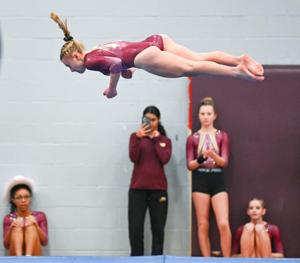 Bloomington North’s Sofia Garcia performs her floor routine during the gymnastics meet against Bloomington South and Edgewood at South on Monday, Jan. 8, 2024.