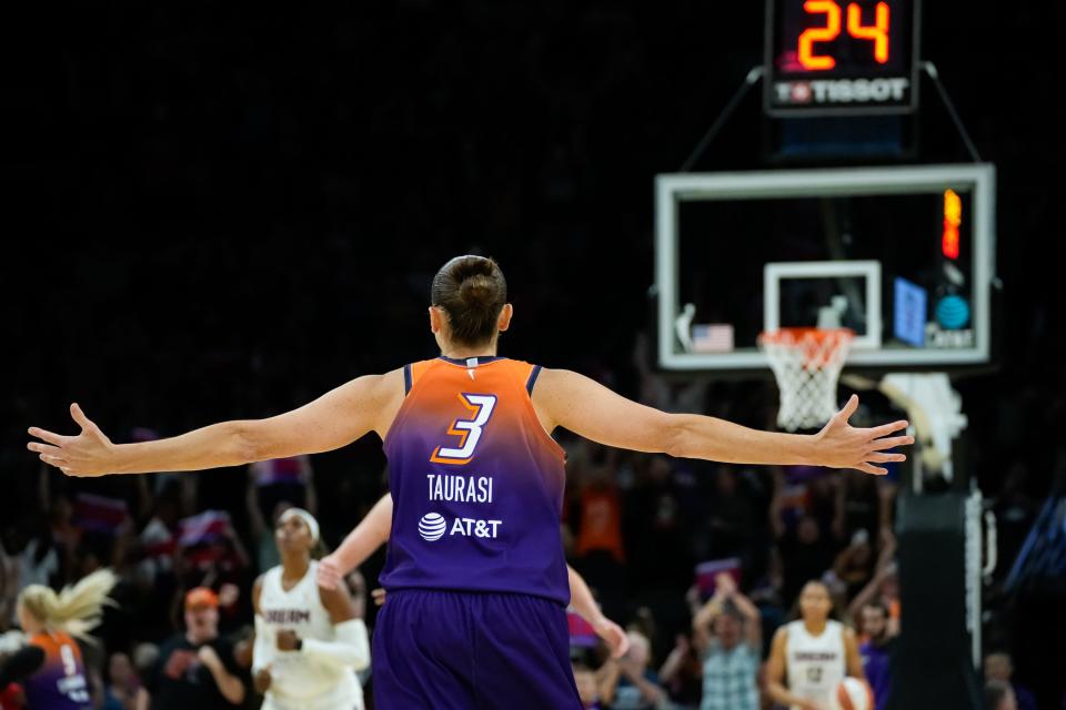 Diana Taurasi (3) of the Phoenix Mercury celebrates after making a record-breaking shot, earning 10,000 total career points during a game at Footprint Center on August 3, 2023, in Phoenix, AZ.