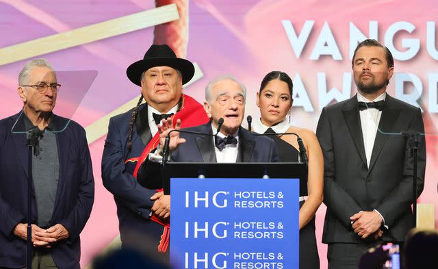 <p>Matt Winkelmeyer/Getty</p> From L: Robert De Niro, Yancey Red Corn, Martin Scorsese, Jillian Dion and Leonardo DiCaprio accept the Vanguard Award for <em>Killers of the Flower Moon</em> (2023) during the Palm Springs International Film Awards on Jan. 4, 2024