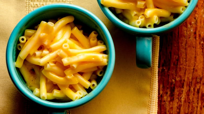 Cup filled with mac and cheese