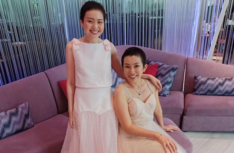 Lim (right) and Ding have constantly been supporting each other as breast cancer survivors. — Picture courtesy of Lim Xiao Yun