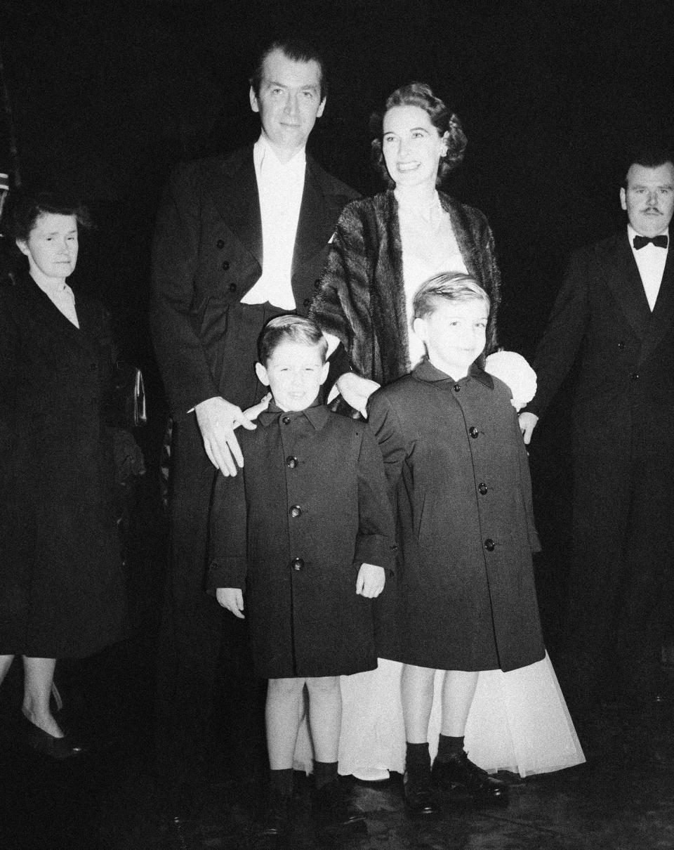 James Stewart arrives with his wife and two sons for the command performance of “The Mudlark” at the Empire Theatre in Leicester Square, London, England, Oct. 30, 1950. | Laurence Harris, Associated Press