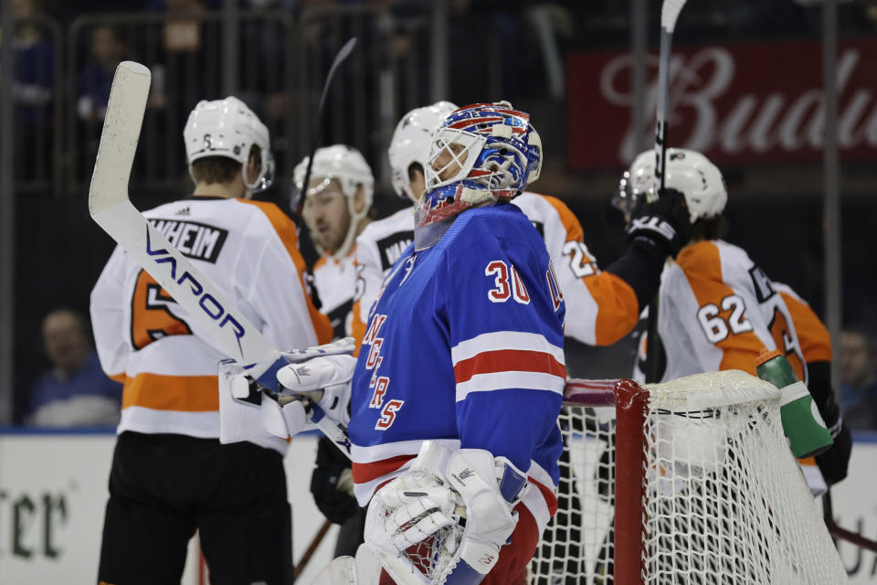 New York Rangers goaltender Henrik Lundqvist reacts after being scored on by the Philadelphia Flyers during the first period of the NHL hockey game, Sunday, March 1, 2020, in New York. (AP Photo/Seth Wenig)
