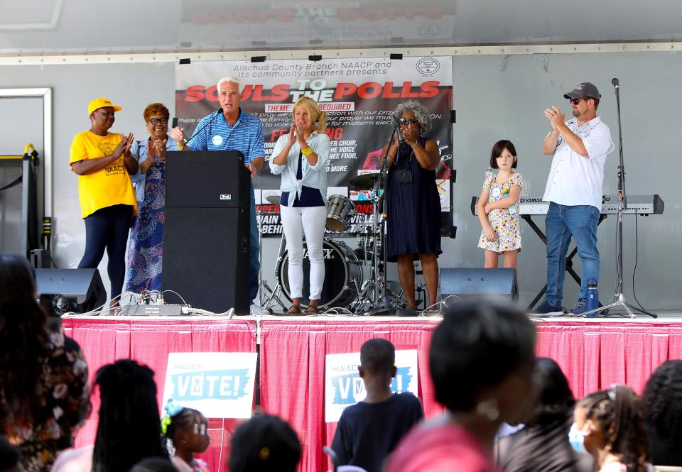 Charlie Crist, at podium, speaks at a Souls to the Polls event in Gainesville on Aug. 14. Crist won the Democratic gubernatorial primary nomination in August and is running against incumbent Rep. Gov. Ron DeSantis for governor. Early voting ends Sunday and election day will be 7 a.m.-7 p.m. Tuesday.  [Brad McClenny/The Gainesville Sun]