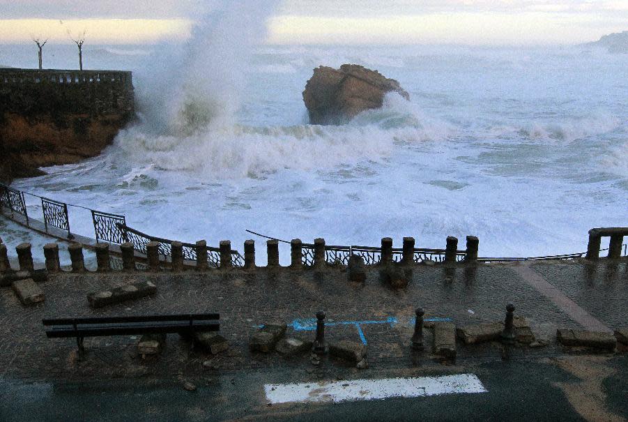 Big waves crash into the beach of Biarritz, southwestern France, Tuesday, Jan. 7, 2014. There has been a weather alert for high waves in the south west of France since Monday. (AP Photo/Bob Edme)