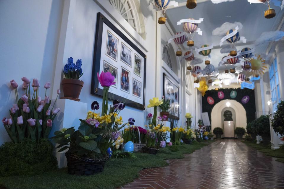 Decorations for the White House Easter Egg Roll adorn the East Colonnade of the White House, Thursday, March 28, 2024, in Washington. (AP Photo/Evan Vucci)