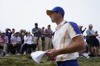 Team Europe's Rory McIlroy walks to the fourth hole during a Ryder Cup singles match at the Whistling Straits Golf Course Sunday, Sept. 26, 2021, in Sheboygan, Wis. (AP Photo/Charlie Neibergall)