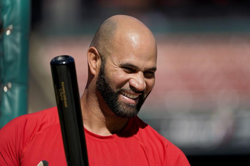 St. Louis Cardinals slugger Albert Pujols smiles during batting practice on Oct. 6.