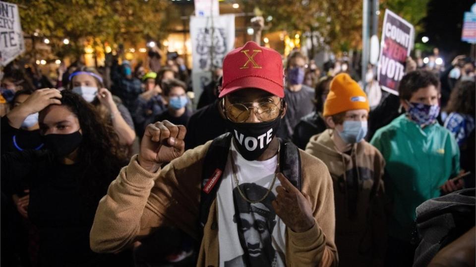 People rally to demand that every vote be counted outside of the Pennsylvania Convention Center in Philadelphia