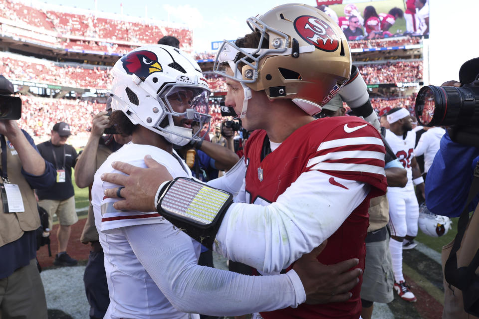 Arizona Cardinals quarterback Kyler Murray, left, greets San Francisco 49ers quarterback Brock Purdy after an NFL football game in Santa Clara, Calif., Sunday, Oct. 6, 2024. (AP Photo/Jed Jacobsohn)