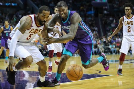 Nov 3, 2018; Charlotte, NC, USA; Charlotte Hornets guard Jeremy Lamb (3) and Cleveland Cavaliers guard JR Smith (5) scramble for the loose ball during the second half at Spectrum Center. Jim Dedmon-USA TODAY Sports