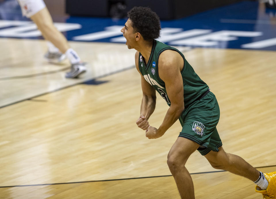 Ohio forward Ben Roderick (3) reacts after scoring during the second half of a first-round game against Virginia in the NCAA men's college basketball tournament, Saturday, March 20, 2021, at Assembly Hall in Bloomington, Ind. (AP Photo/Doug McSchooler)